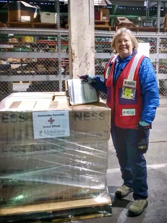 Red Cross worker accepting donations