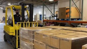 forklift driver in new food storage warehouse