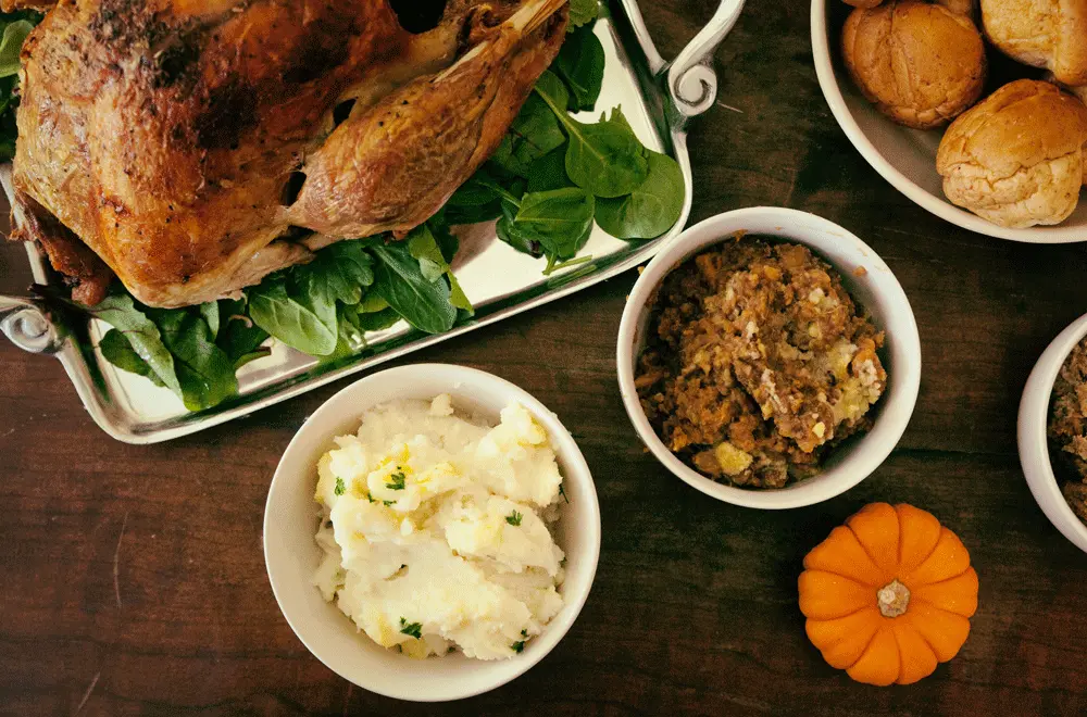 Turney, potatoes, and stuffing on a table