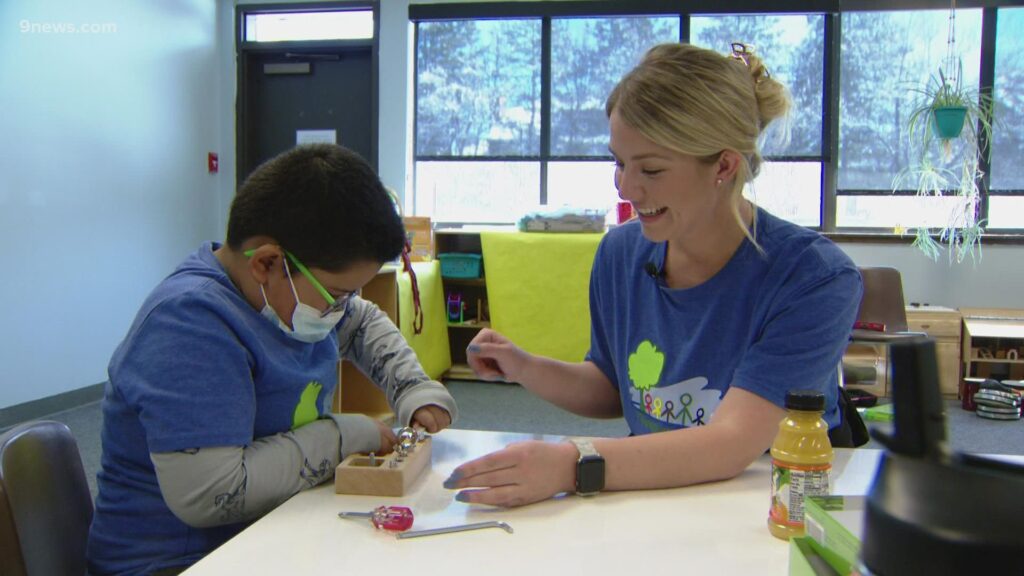 An autistic child with a specialist.
